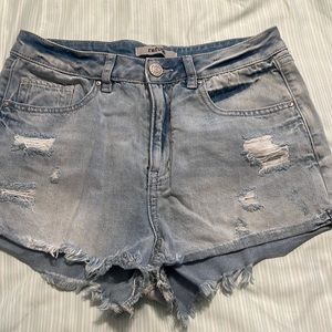 Light wash distressed jean shorts